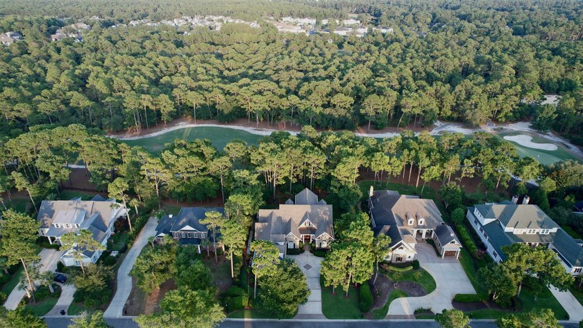 Set on the 11th fairway of The Reserve, 681 Reserve Drive is an - photo 5