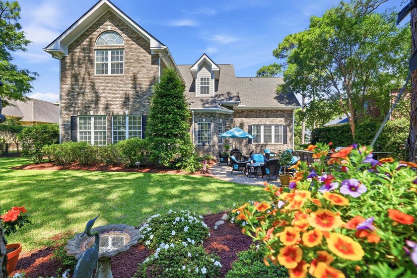 Set on the 11th fairway of The Reserve, 681 Reserve Drive is an - photo 6