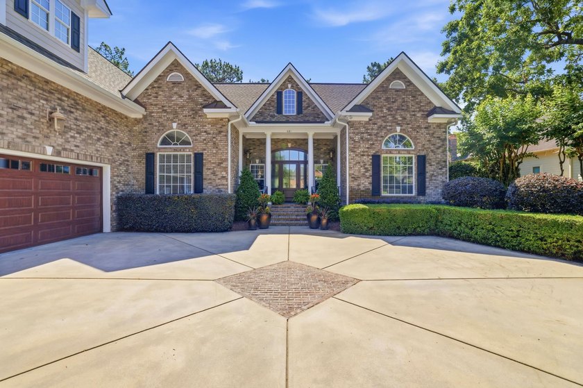 Set on the 11th fairway of The Reserve, 681 Reserve Drive is an - photo 7