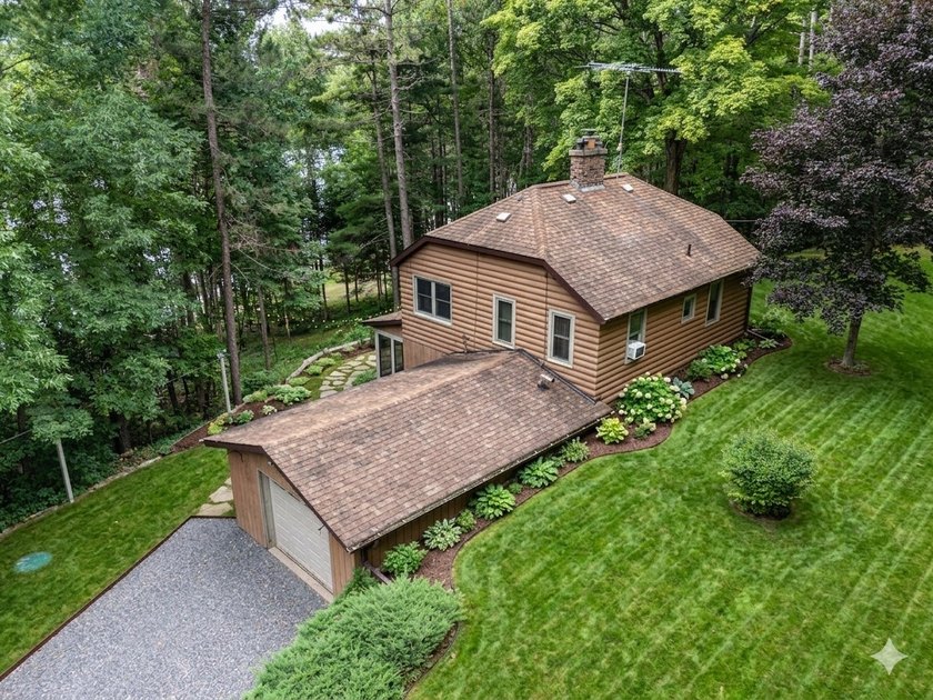 Discover your own peaceful retreat with this unique Northwoods - photo 3