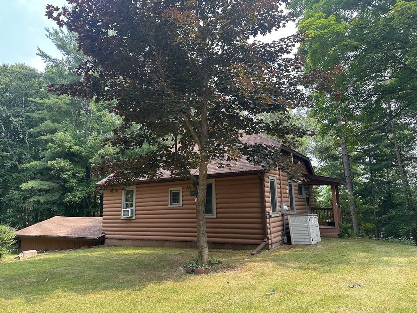 Discover your own peaceful retreat with this unique Northwoods - photo 4