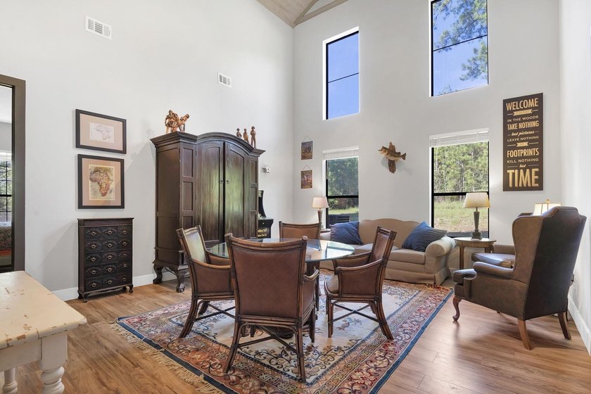 This extraordinary property, INCLUDING BOAT nestled within the - photo 9