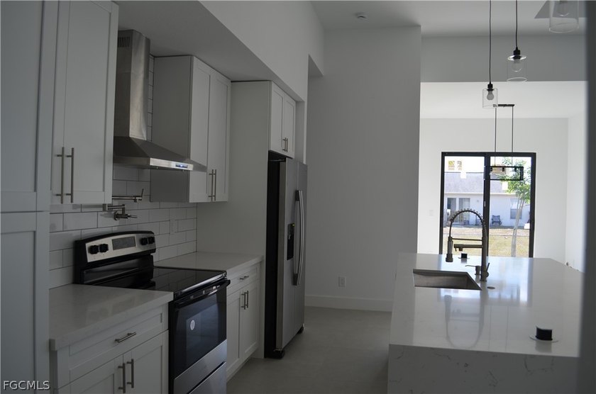 Embrace luxury living in this brand new single-family home in - photo 8