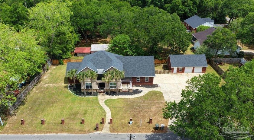 This impressive two-story home showcases timeless curb appeal - photo 50