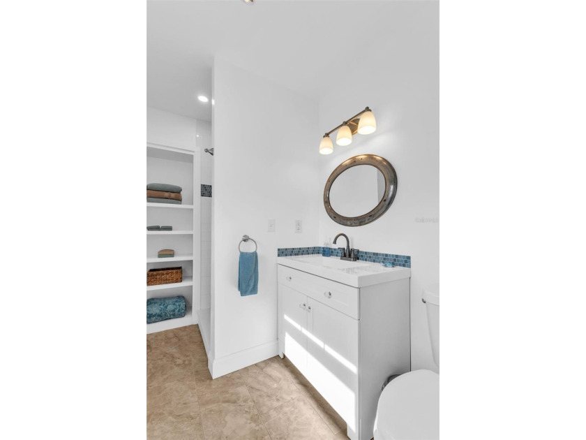 SOLD FURNISHED AND TURNKEY, ALLOWING FOR A SEAMLESS MOVE IN - photo 22