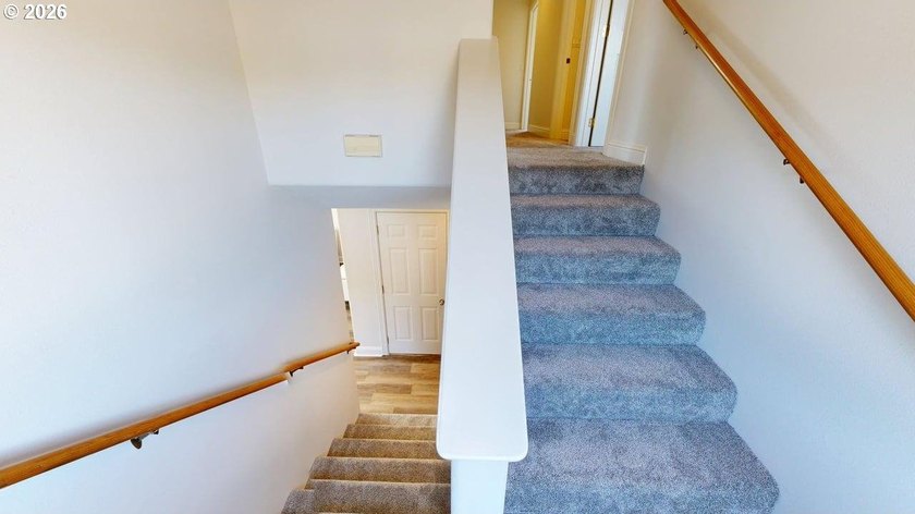 Three bedrooms and a spacious two-level layout set the tone for - photo 13
