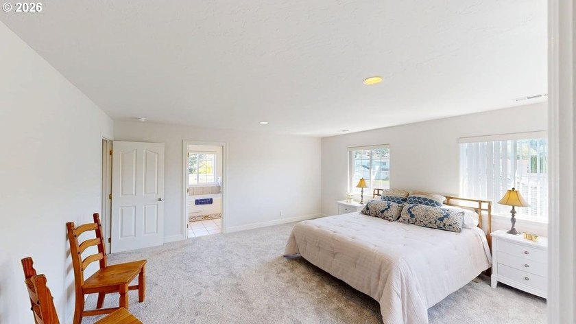 Three bedrooms and a spacious two-level layout set the tone for - photo 15
