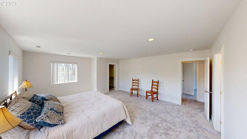 Three bedrooms and a spacious two-level layout set the tone for - photo 16
