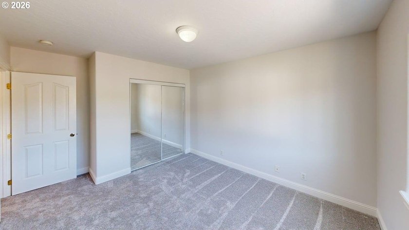 Three bedrooms and a spacious two-level layout set the tone for - photo 22