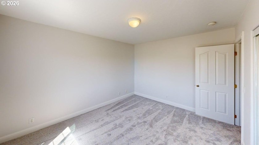 Three bedrooms and a spacious two-level layout set the tone for - photo 23
