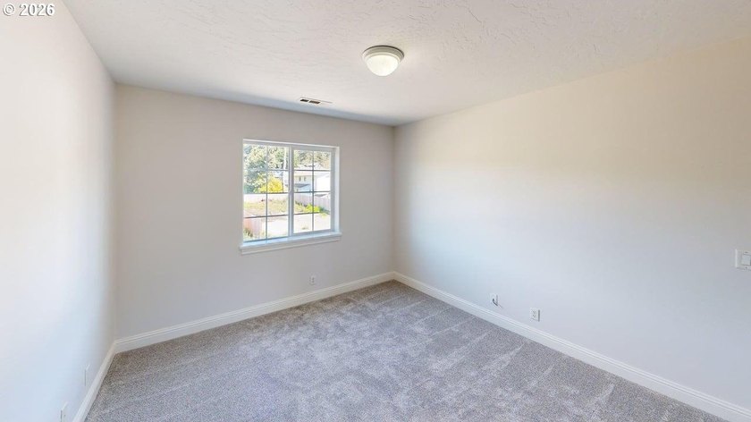 Three bedrooms and a spacious two-level layout set the tone for - photo 27