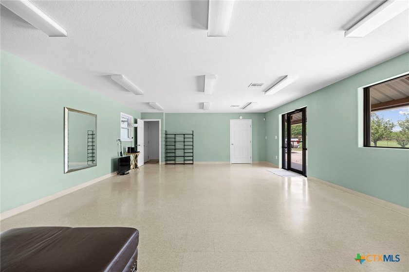 Discover the perfect Work/Live property on +/-10 acres in - photo 4