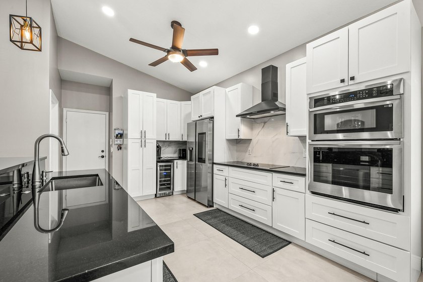 Welcome to this beautifully maintained home in the highly sought - photo 7
