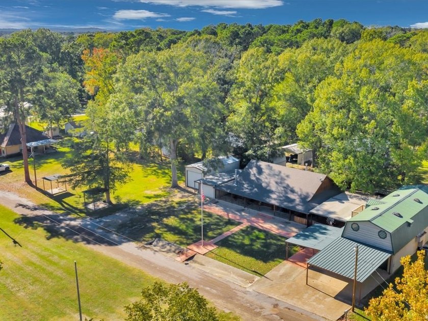 This lake property is special, featuring multiple living - photo 3