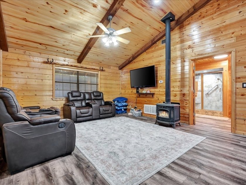 This lake property is special, featuring multiple living - photo 8