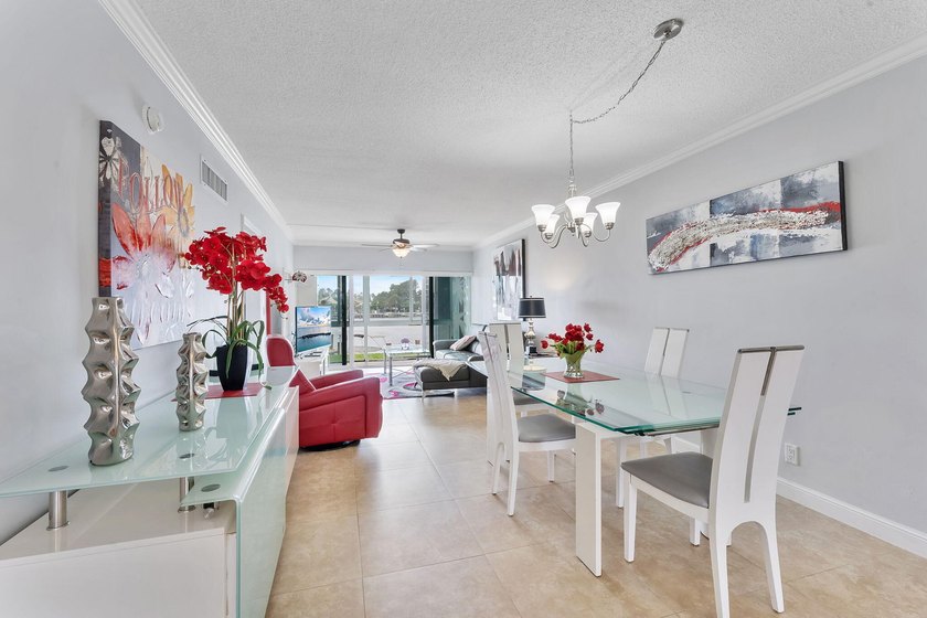 Live the South Florida lifestyle in this beautifully updated 2 - photo 2