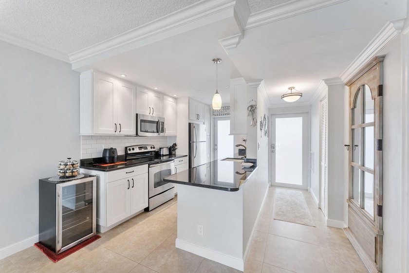 Live the South Florida lifestyle in this beautifully updated 2 - photo 8