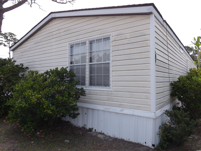 Come and check this manufactured home out with a lot going for - photo 2