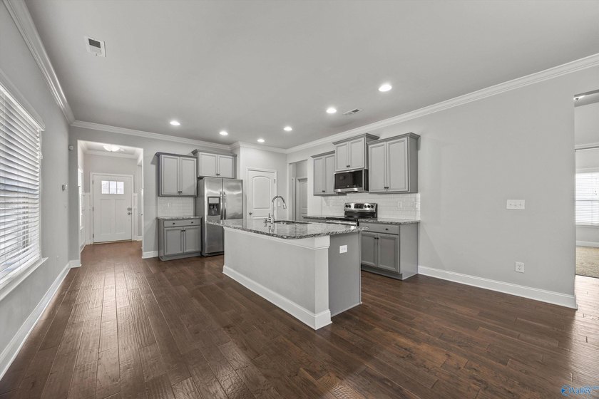 Luxury Living in Lake Forest! Lake Forest features waterfall - photo 9