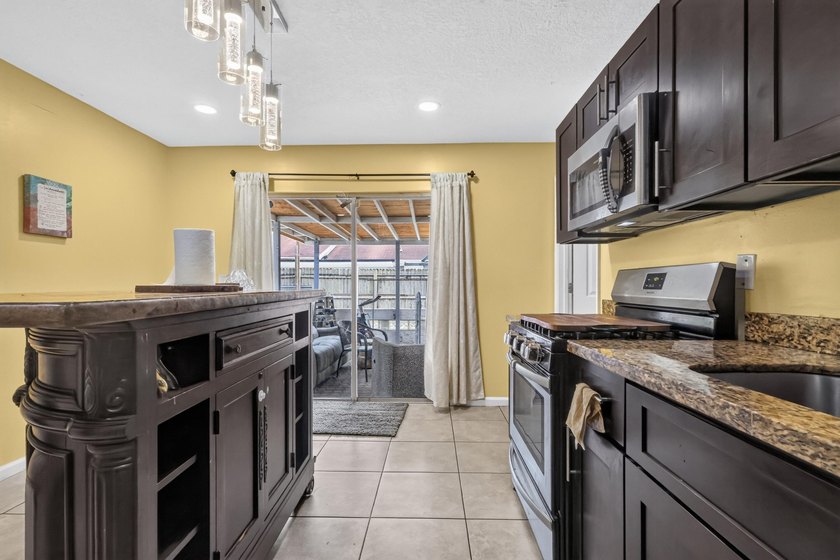 pack your bags and moving into this cozy 4 bedroom 2 bath with - photo 17
