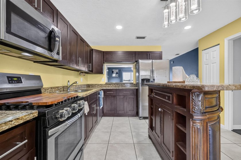 pack your bags and moving into this cozy 4 bedroom 2 bath with - photo 19
