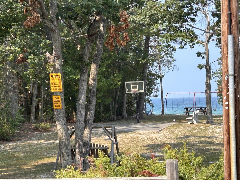 Start enjoying this Up North getaway just steps from the shores - photo 31
