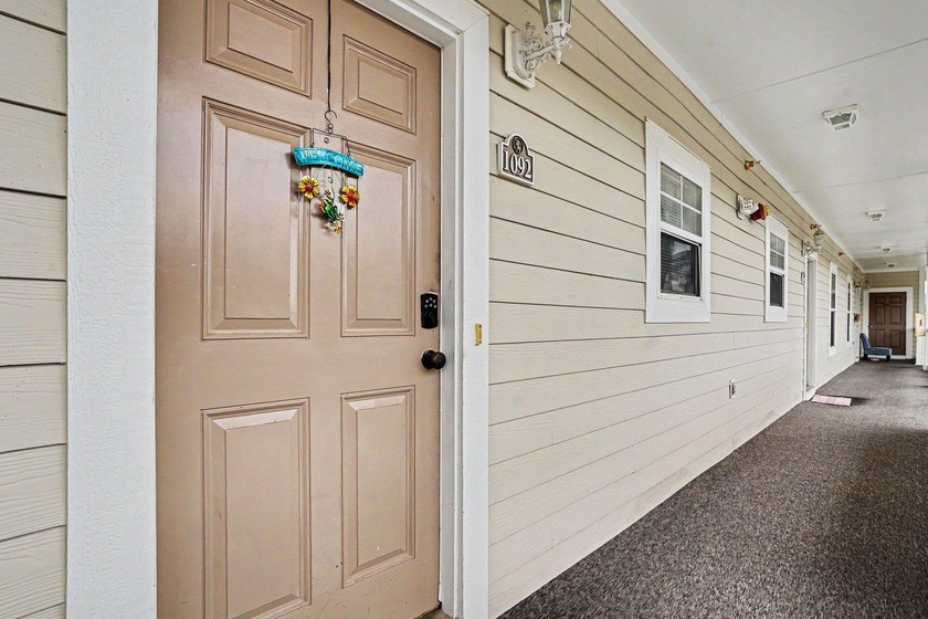 Welcome to this two-bedroom, two-bathroom top-floor condo - photo 4