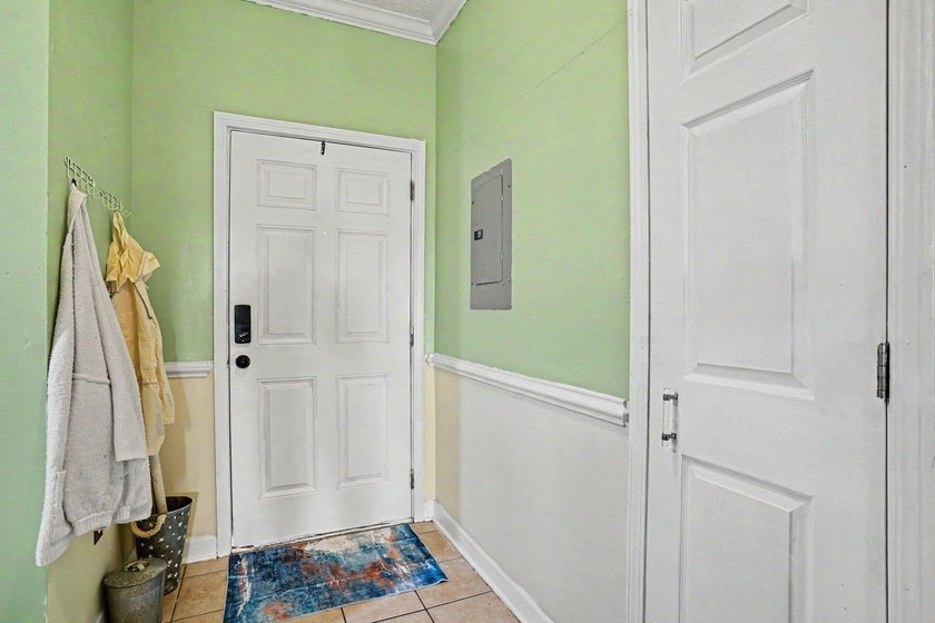 Welcome to this two-bedroom, two-bathroom top-floor condo - photo 5
