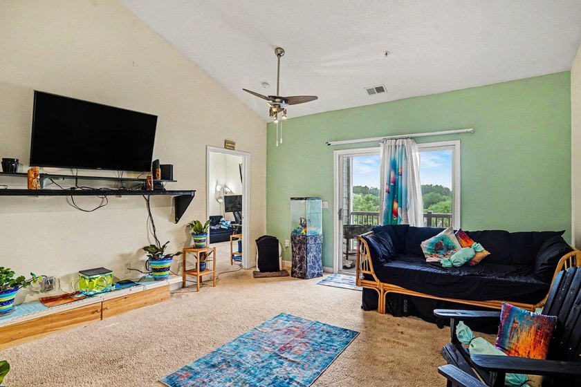 Welcome to this two-bedroom, two-bathroom top-floor condo - photo 8
