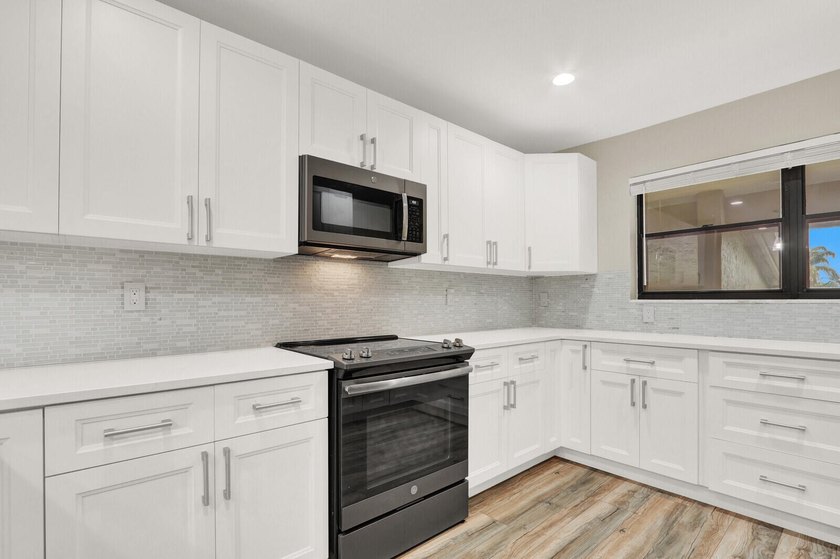 Welcome To This Beautifully Updated 2 Bedroom 2 Bathroom Condo - photo 6