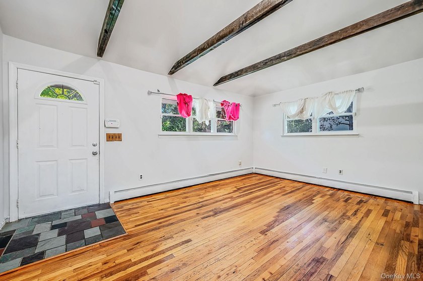 Welcome to 71 Pinewood Drive, a well-maintained 4-bedroom - photo 2