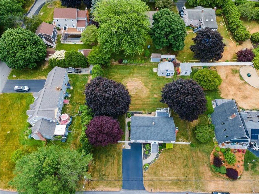 Discover the potential of this raised ranch located in the - photo 5