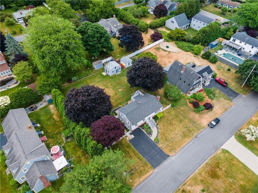 Discover the potential of this raised ranch located in the - photo 6