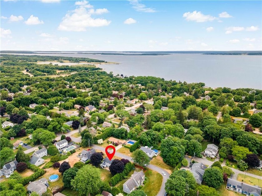 Discover the potential of this raised ranch located in the - photo 8