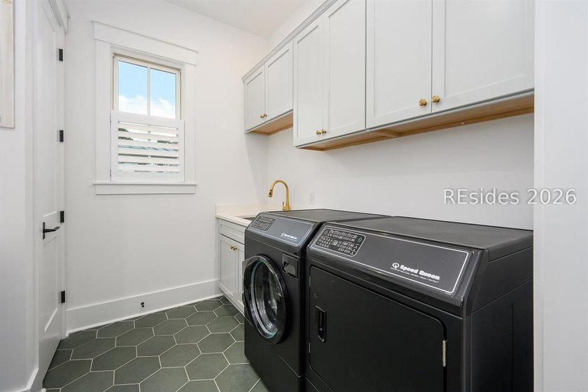 Completed in 2024, this beautifully designed 3-bedroom, 2-bath - photo 14