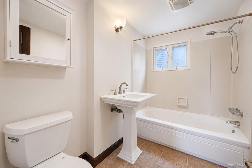 Welcome to a home where comfort, character, and coastal charm - photo 9