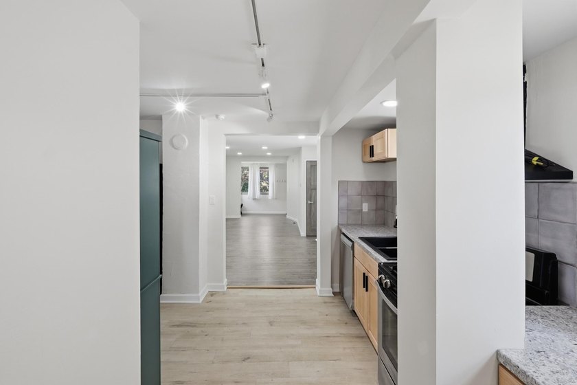 Historic character meets fresh, modern living in this - photo 14