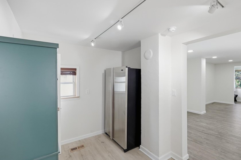 Historic character meets fresh, modern living in this - photo 15