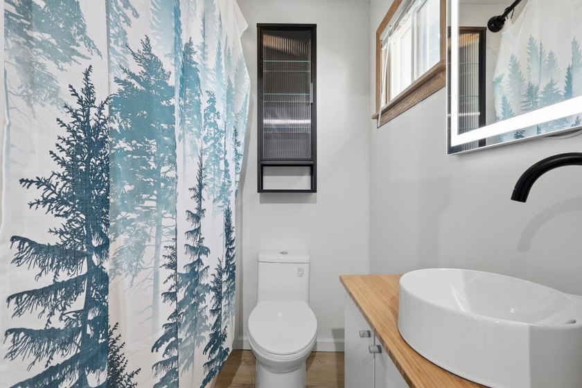 Historic character meets fresh, modern living in this - photo 16