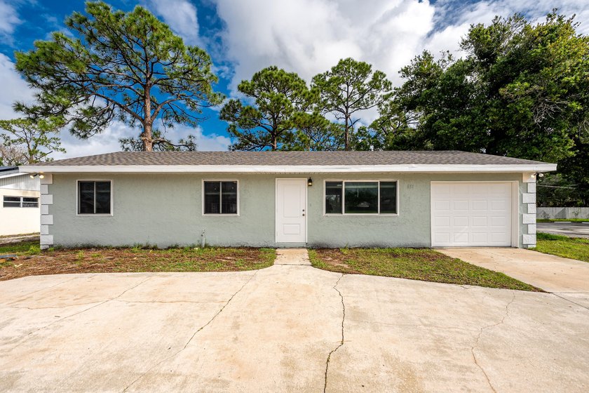 Completely redone and ready to impress! This 3BR/2BA home has - photo 4
