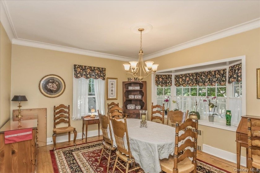 Prime Bayside location meets timeless Colonial charm. Nestled on - photo 7