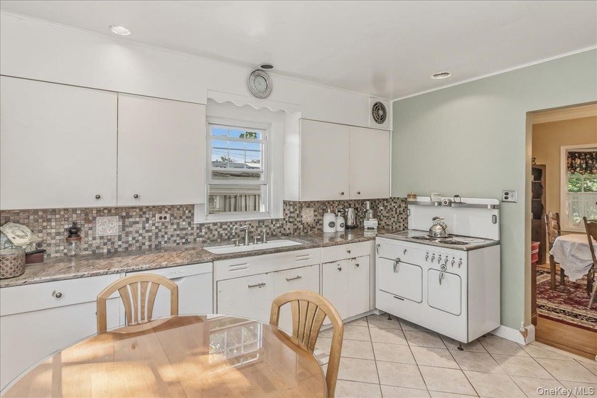 Prime Bayside location meets timeless Colonial charm. Nestled on - photo 10