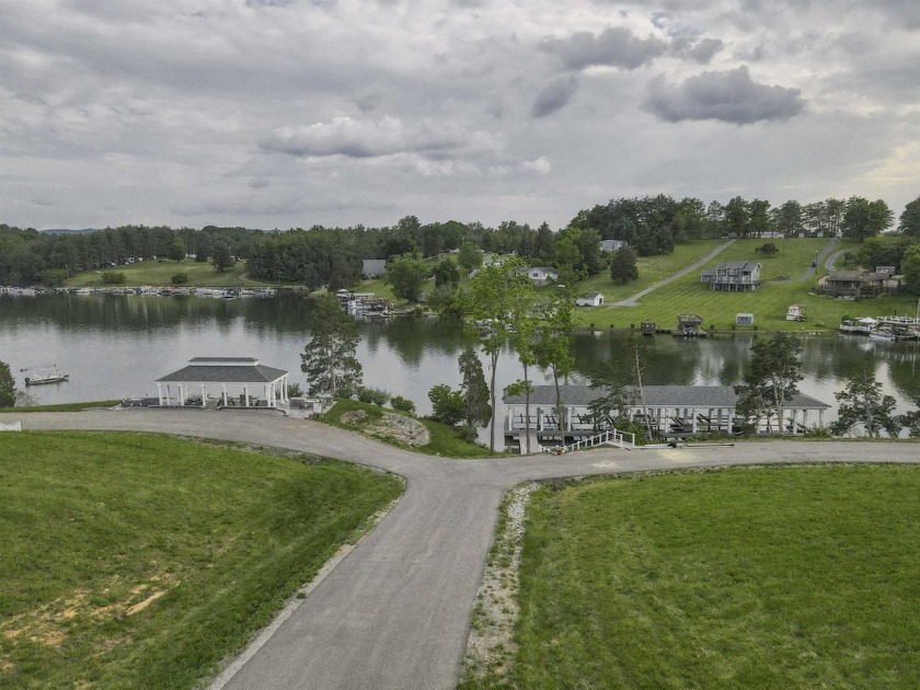 Welcome to Tanager Cove, an upscale lakefront community designed - photo 2