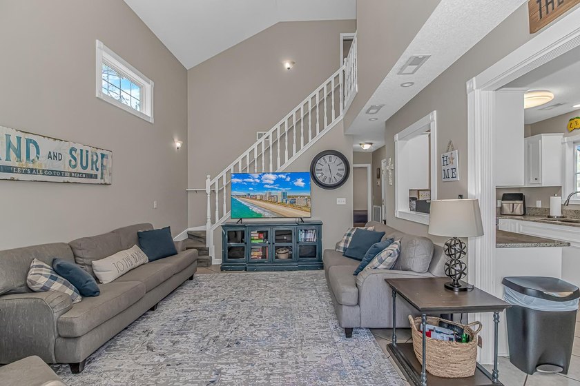 This very open and spacious 4-Bedroom, 3 -Bath raised beach - photo 7