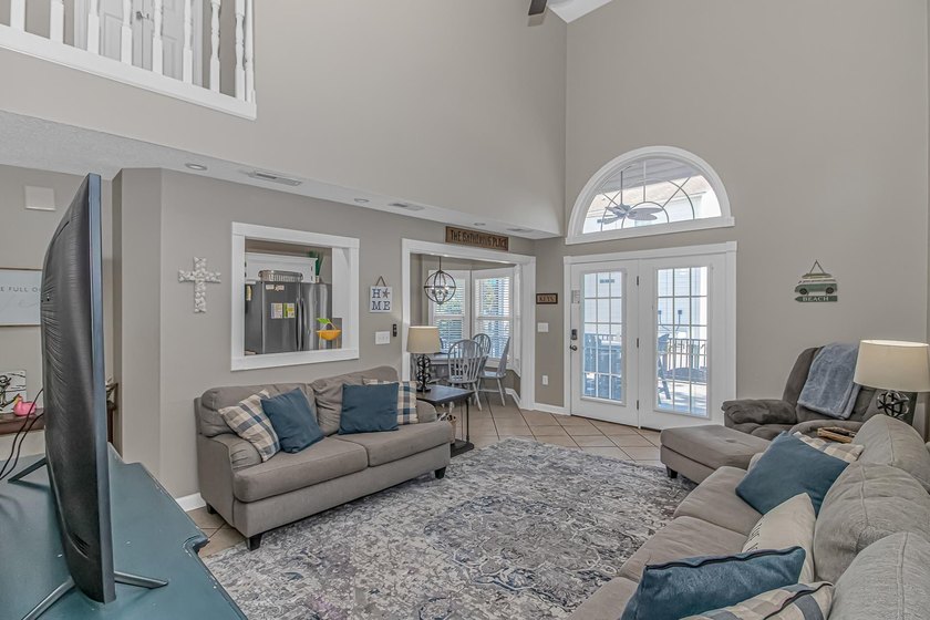 This very open and spacious 4-Bedroom, 3 -Bath raised beach - photo 8