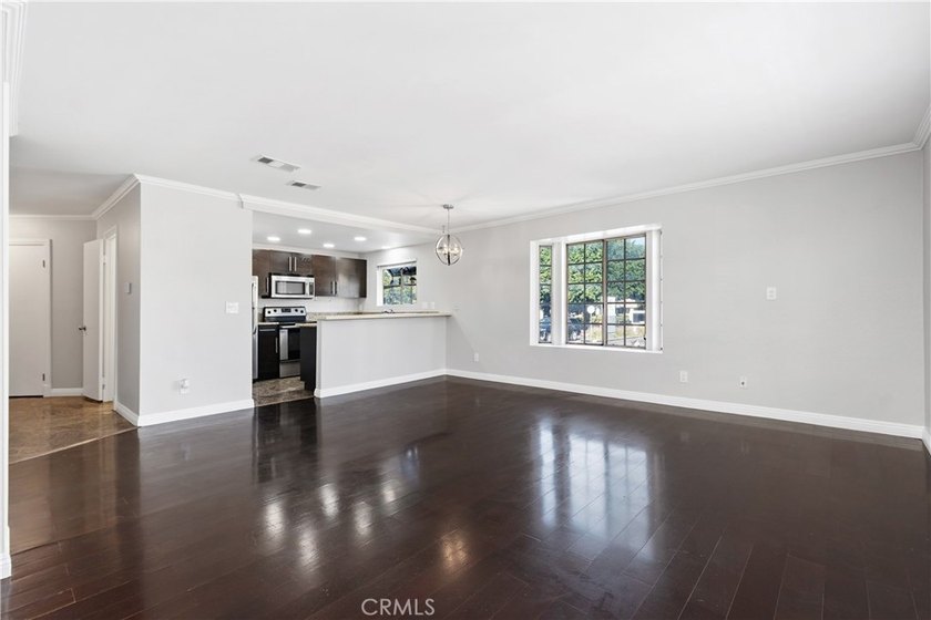This two-story, townhouse-style condominium offers two primary - photo 4