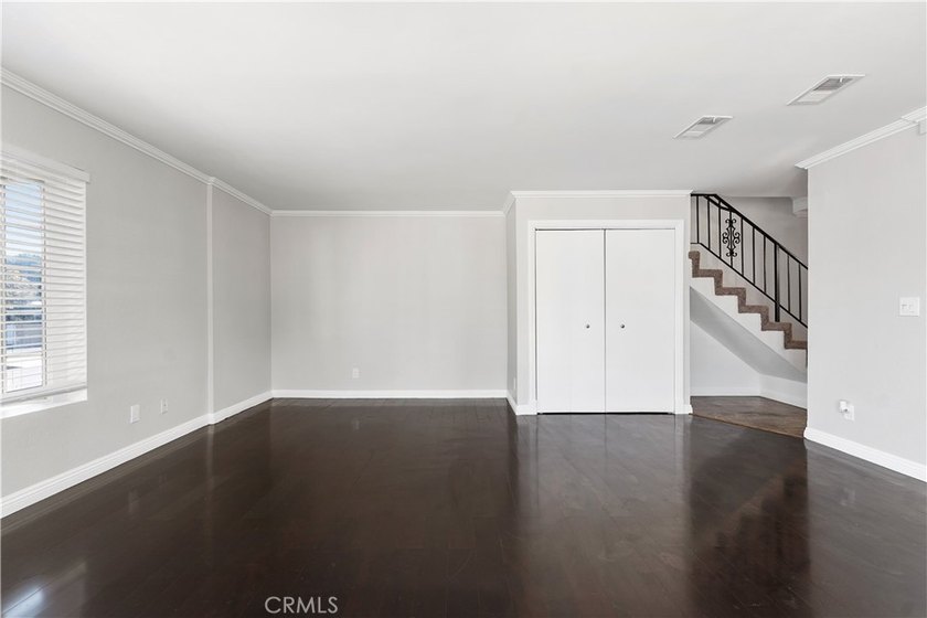 This two-story, townhouse-style condominium offers two primary - photo 9