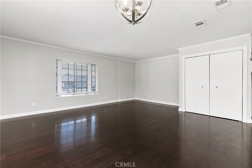 This two-story, townhouse-style condominium offers two primary - photo 10