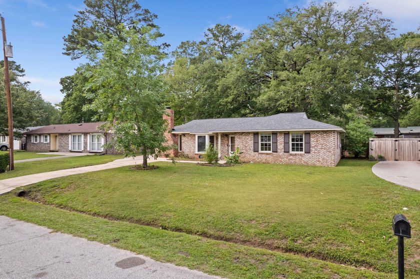 Welcome home to 7708 Jadewood Drive!Nestled in the established - photo 3