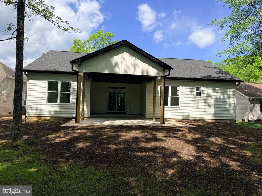 Nestled in the prestigious Lake of the Woods community, this - photo 5